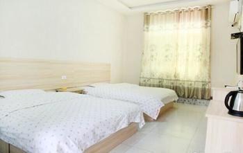 Wuhan Minghang Guesthouse Buitenkant foto